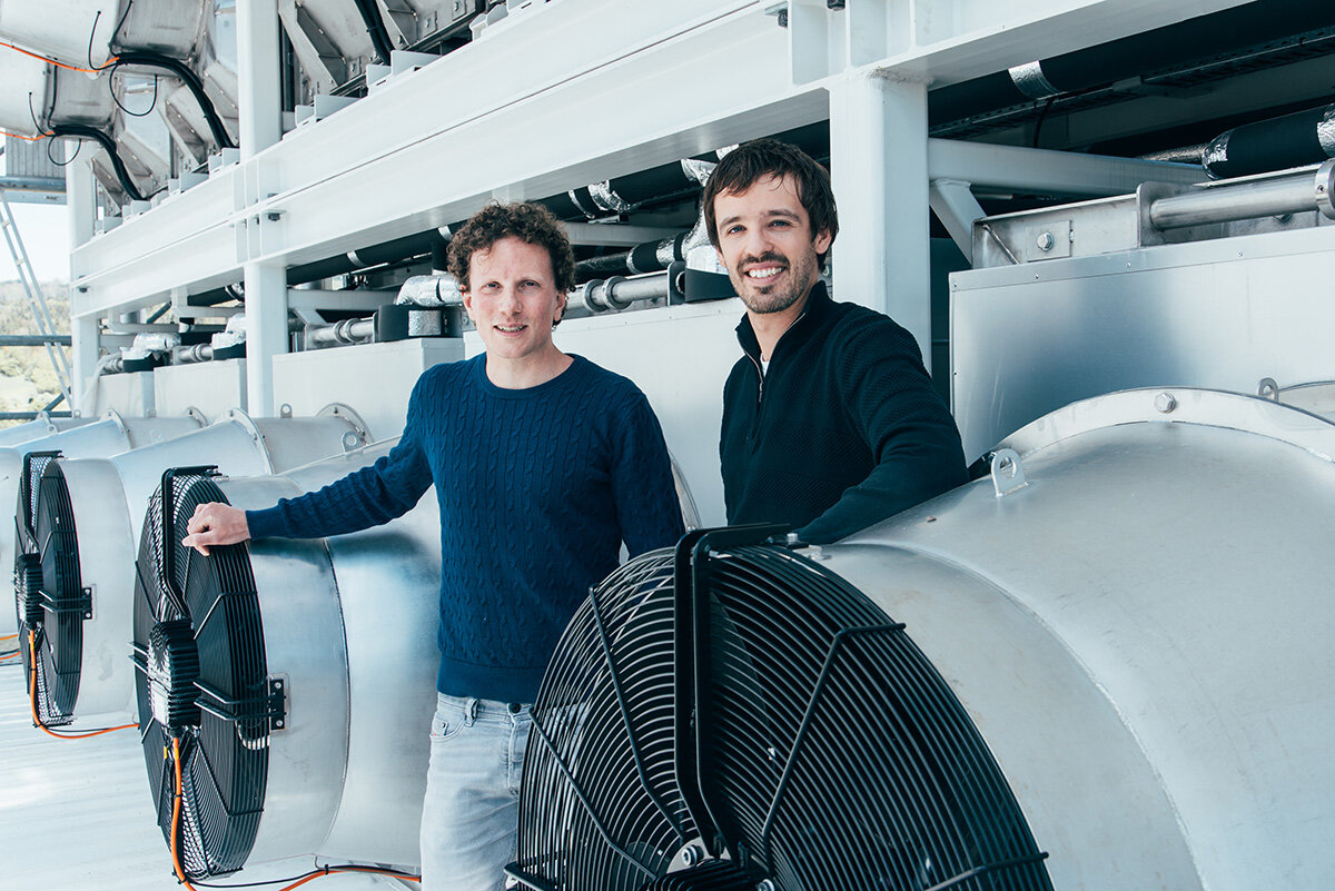 Climeworks founders Christoph Gebald (l) and Jan Wurzbacher in front of the Climeworks plant Copyright Climeworks. Photo by Julia Dunlop